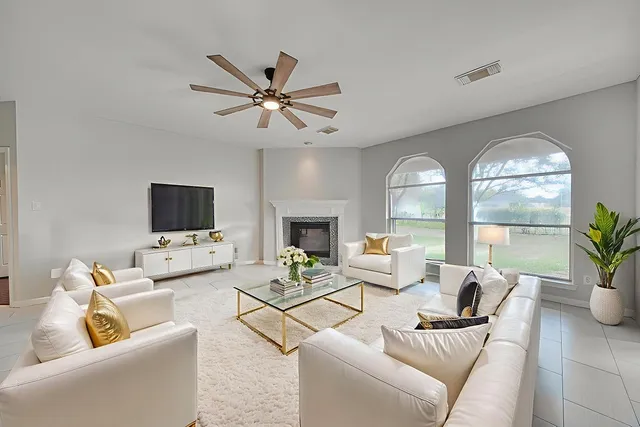 a view of a livingroom with furniture and window