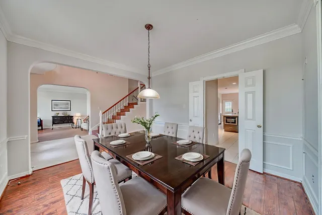 a spacious bathroom with a sink double vanity granite tub shower and mirror