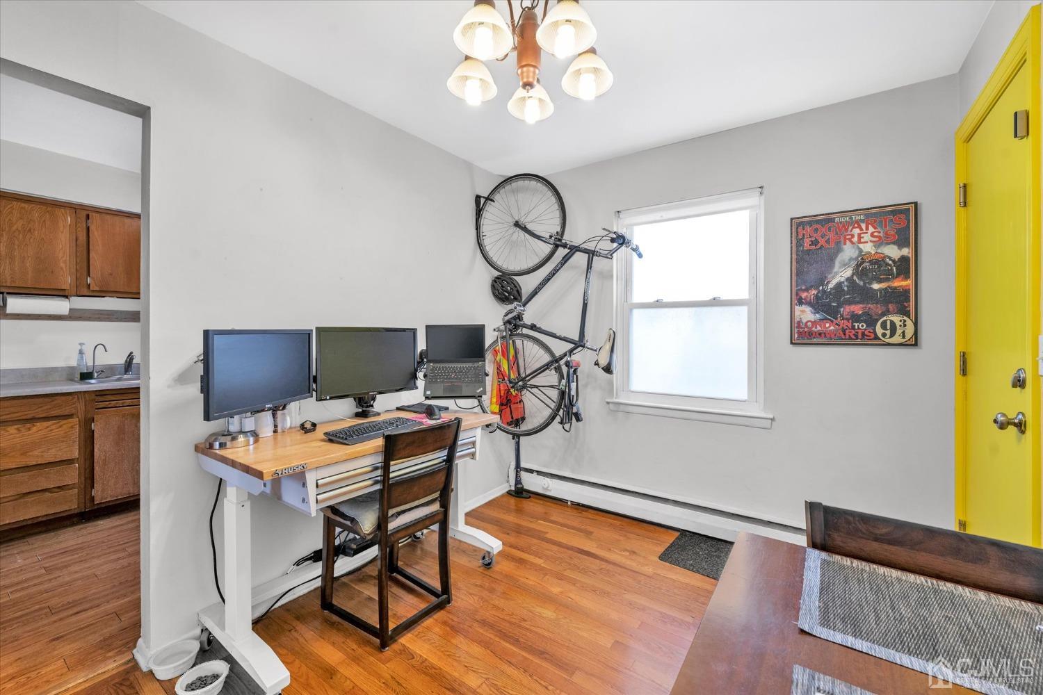 50 Fox Road, Unit 7A Edison, NJ 08817 - Photo 6 of 17 a workspace with furniture and wooden floor