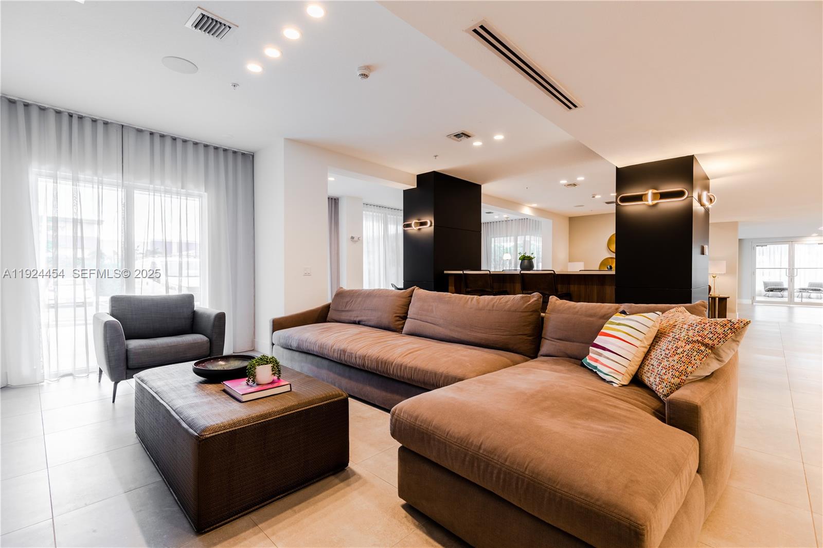 1950 West 49th Street, Unit 108 Hialeah, FL 33012 - Photo 25 of 39 a living room with furniture