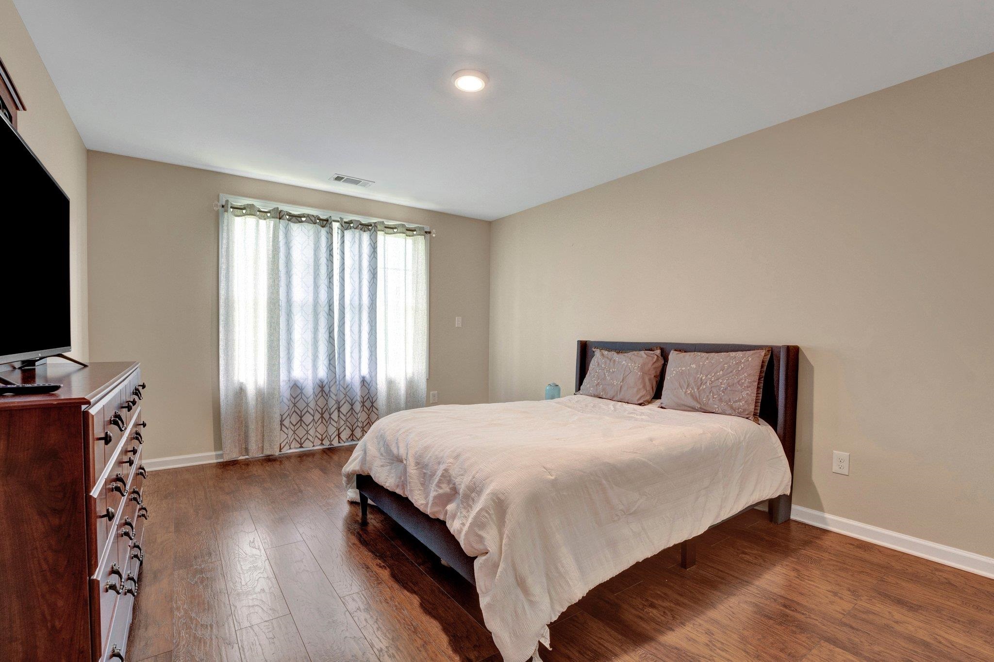 3270 Rast Road Millington, TN 38053 - Photo 29 of 40 Bedroom with hardwood / wood-style flooring and baseboards