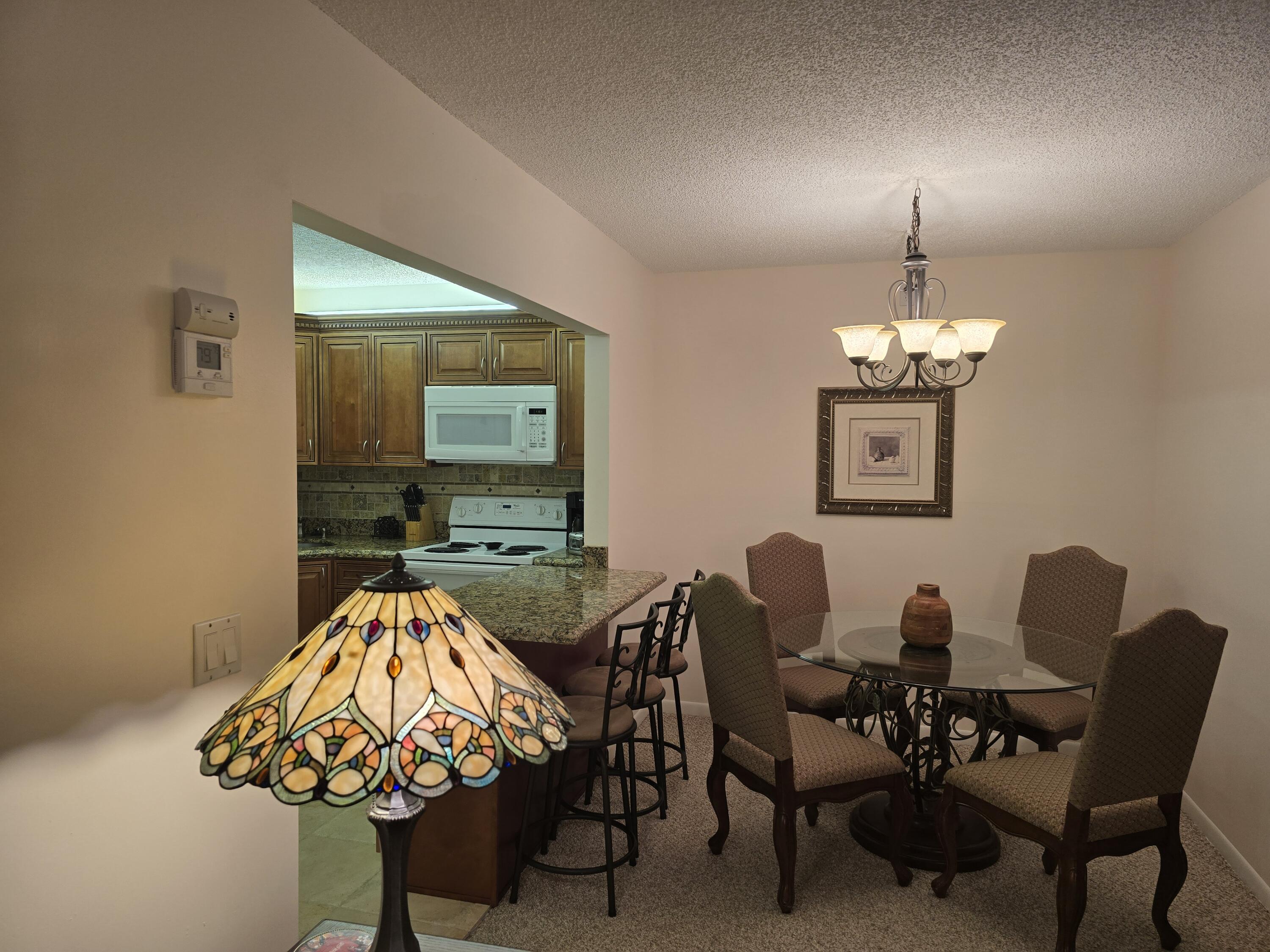 317 Pine Ridge Circle Greenacres, FL 33463 - Photo 8 of 51 dinning room
