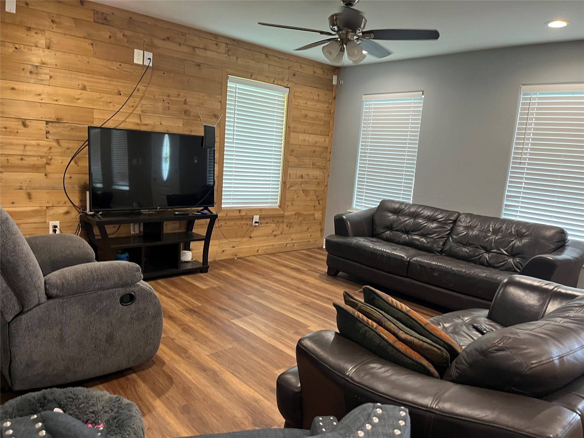 21511 Rio Villa Drive Houston, TX 77049 - Photo 31 of 45 a living room with furniture and a flat screen tv