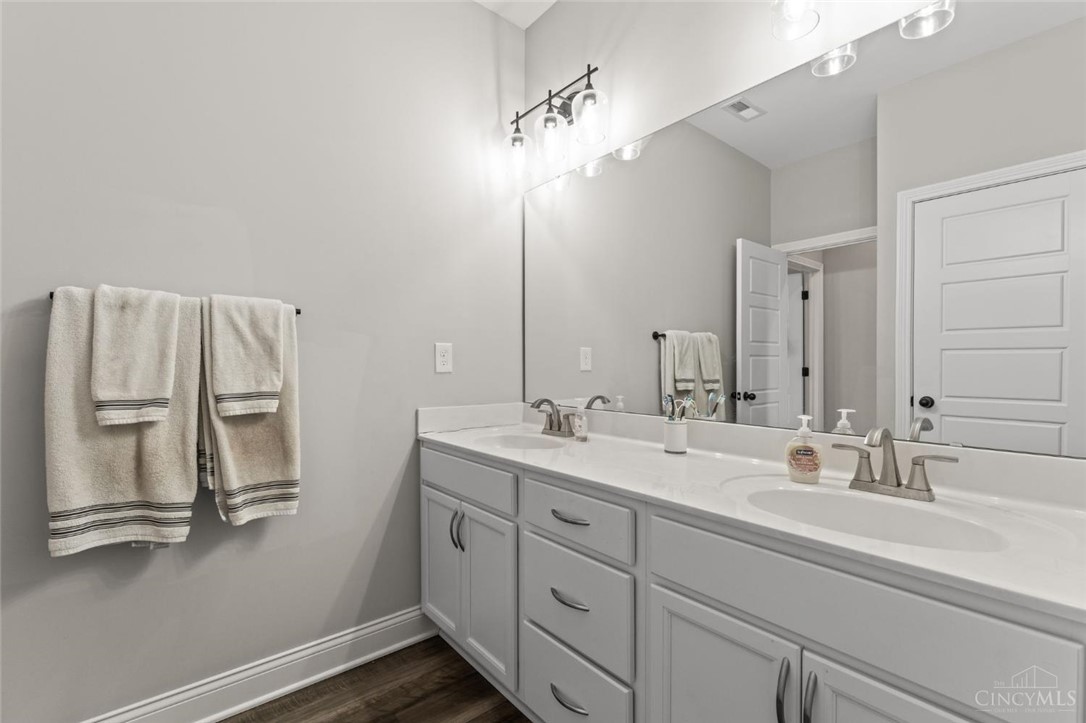 2425 Middleboro Road Clarksville, OH 45113 - Photo 81 of 91 This bright bathroom features a spacious double vanity with ample storage.