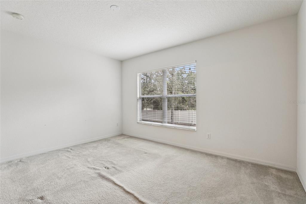 263 Sterling Springs Lane Altamonte Springs, FL 32714 - Photo 19 of 22 an empty room with a window
