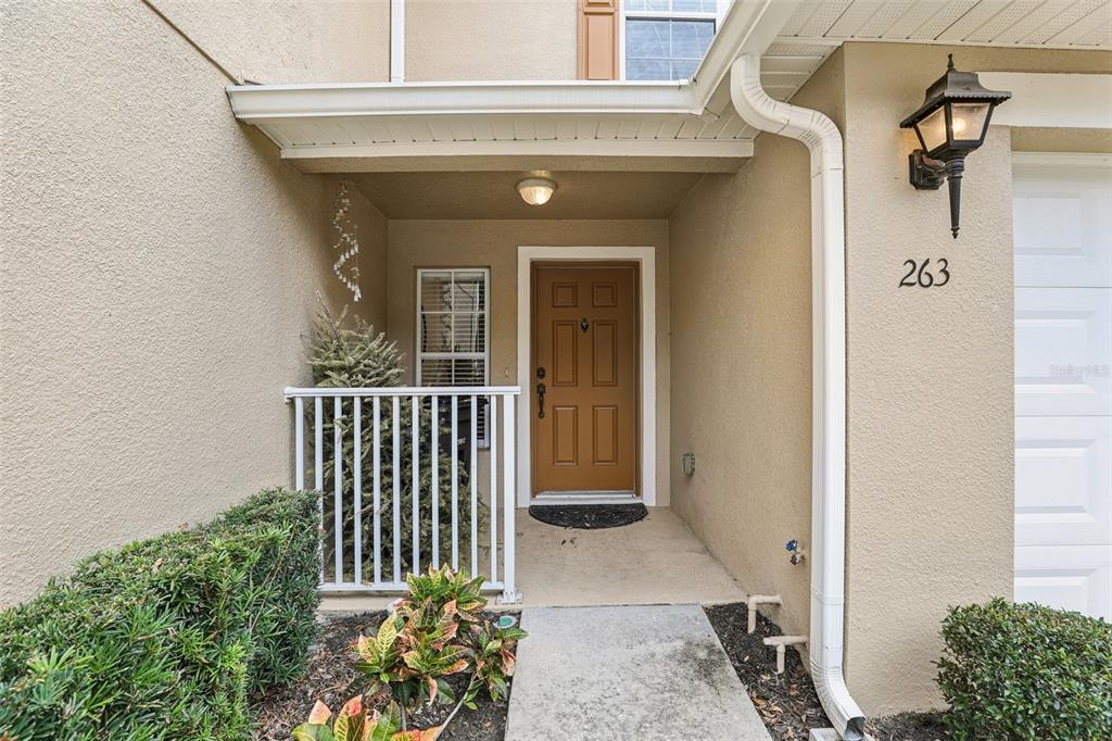 263 Sterling Springs Lane Altamonte Springs, FL 32714 - Photo 2 of 22 a front view of a house with a porch