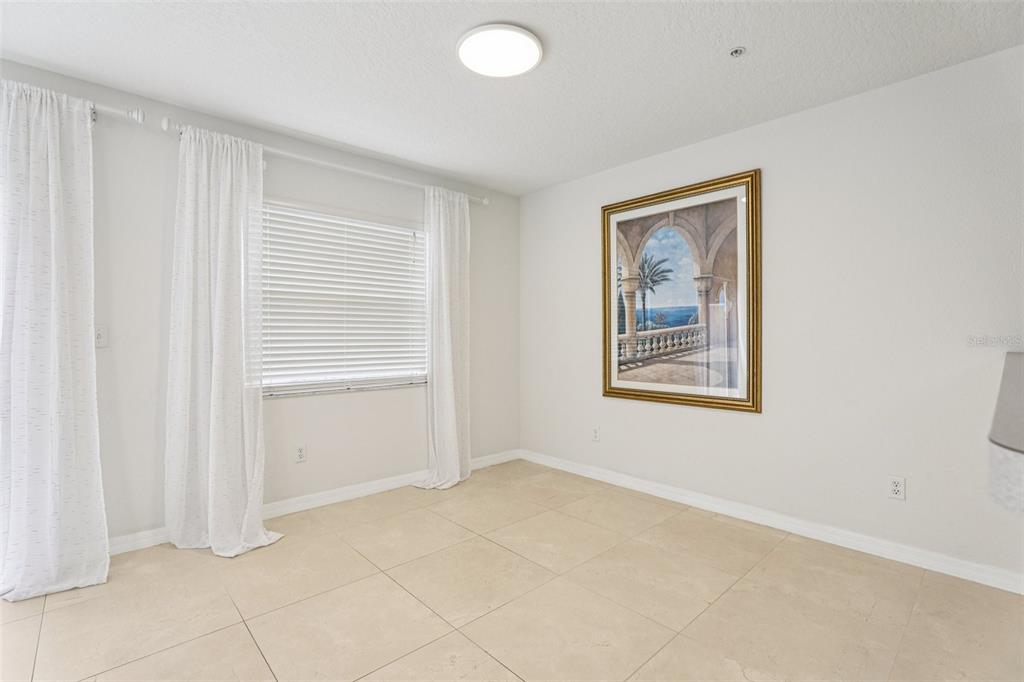 263 Sterling Springs Lane Altamonte Springs, FL 32714 - Photo 6 of 22 a view of an empty room with closet and a window