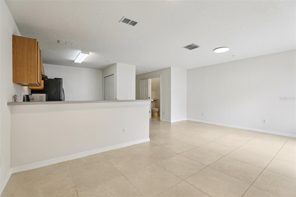 263 Sterling Springs Lane Altamonte Springs, FL 32714 - Photo 7 of 22 a view of a kitchen with a sink and a dishwasher in a kitchen