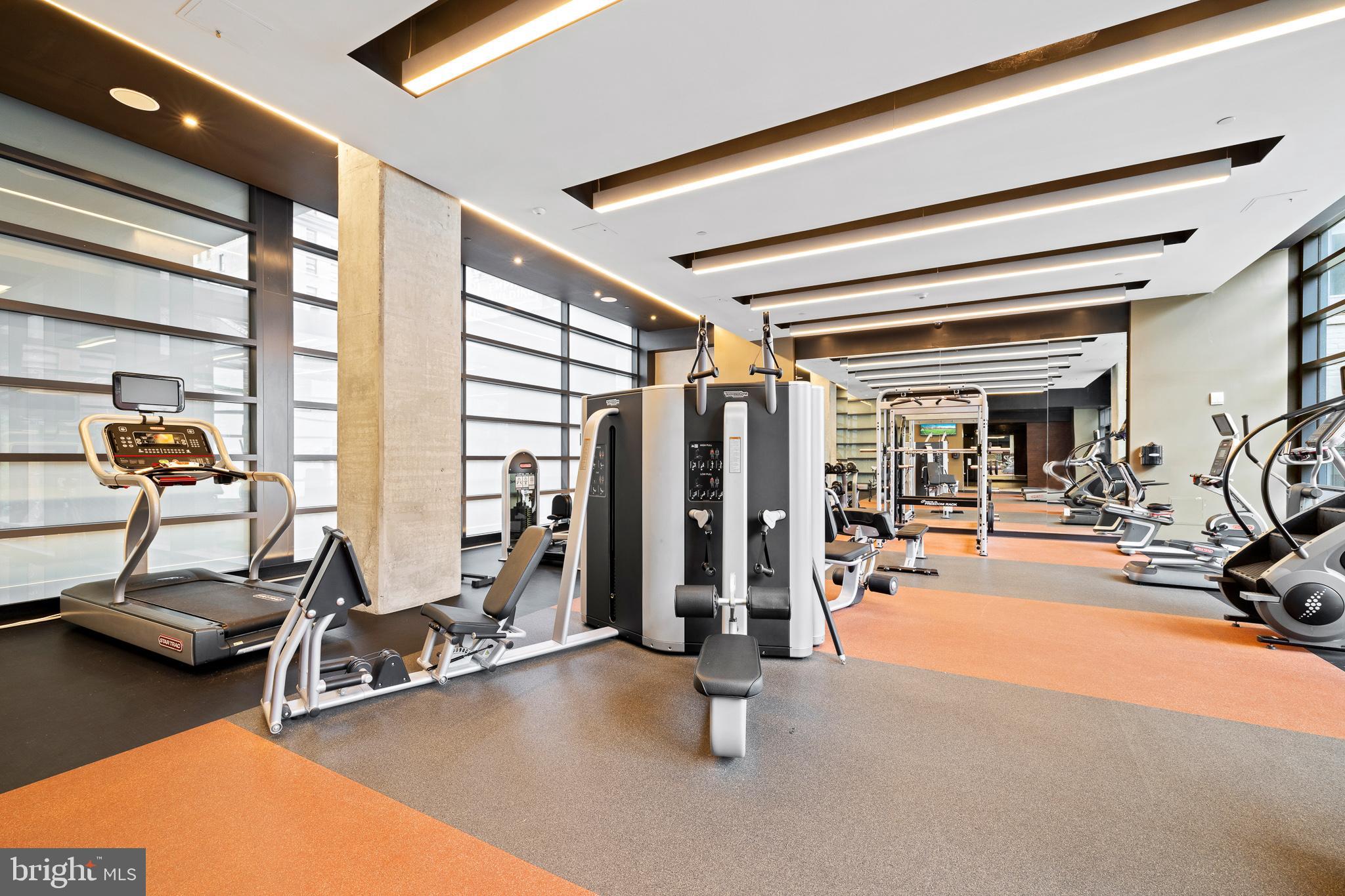 1213 Walnut Street, Unit 1706 Philadelphia, PA 19107 - Photo 19 of 36 a view of a room with gym equipment