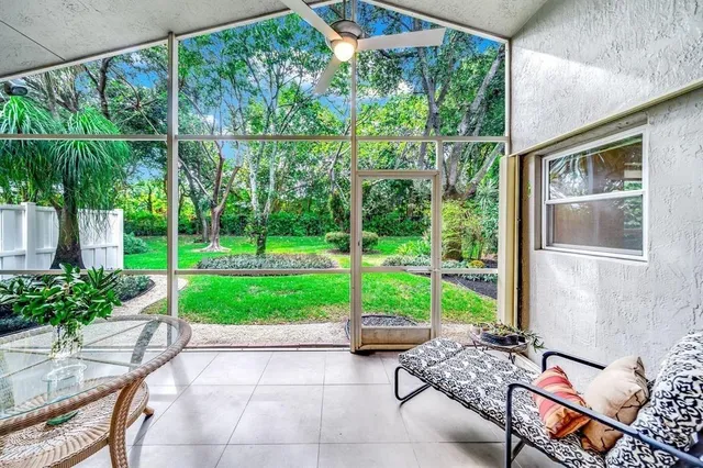 a view of a room with furniture and garden