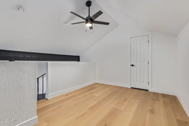 a view of a big room with wooden floor