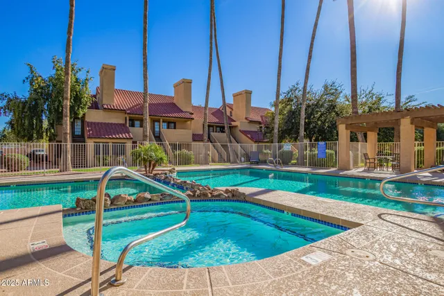 a view of a table and chairs in the garden