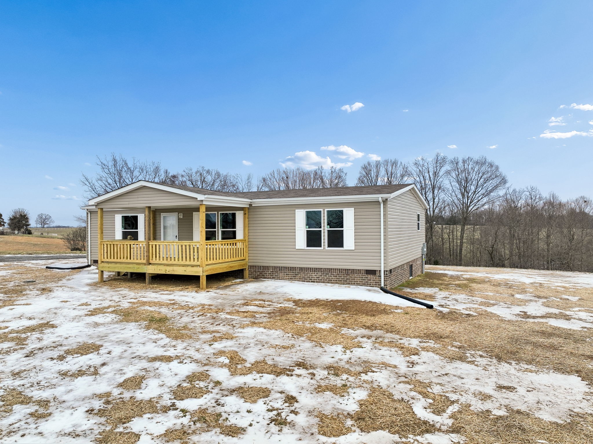 a house with trees in the background
