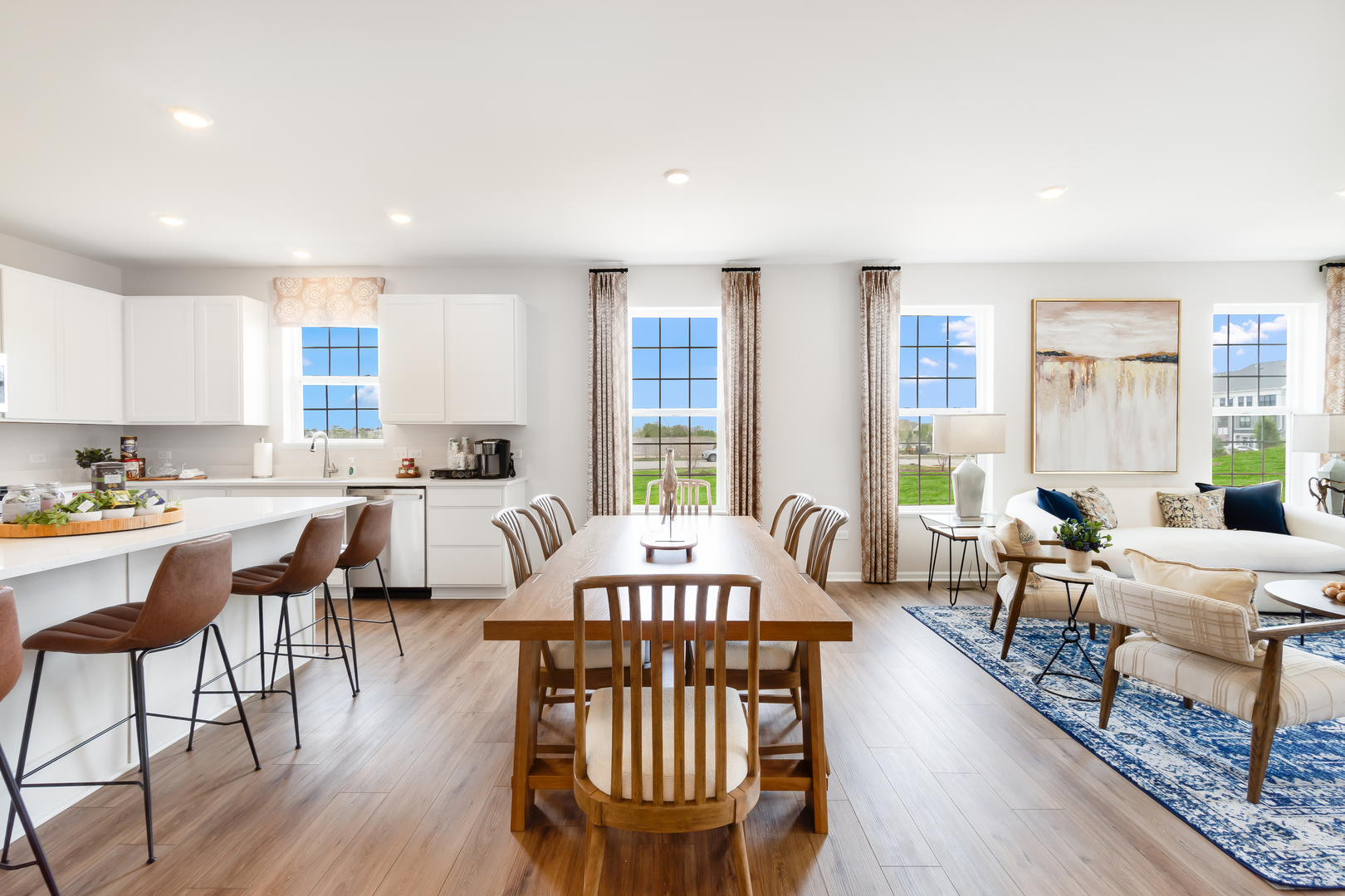 378 Cottrell Lane Aurora, IL 60506 - Photo 15 of 25 a view of a a dining room with furniture window and wooden floor