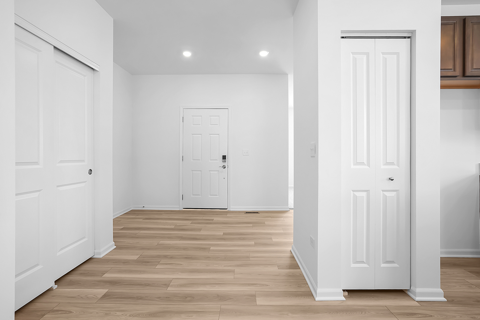 378 Cottrell Lane Aurora, IL 60506 - Photo 7 of 25 a view of empty room with wooden floor