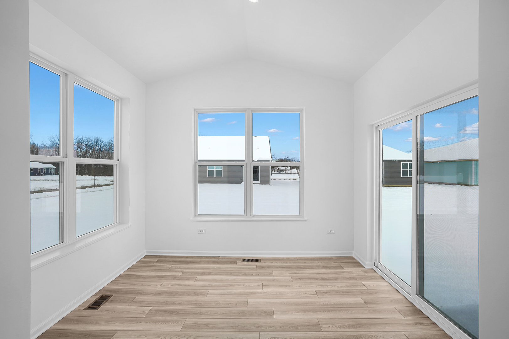 378 Cottrell Lane Aurora, IL 60506 - Photo 8 of 25 a view of empty room with wooden floor and fan