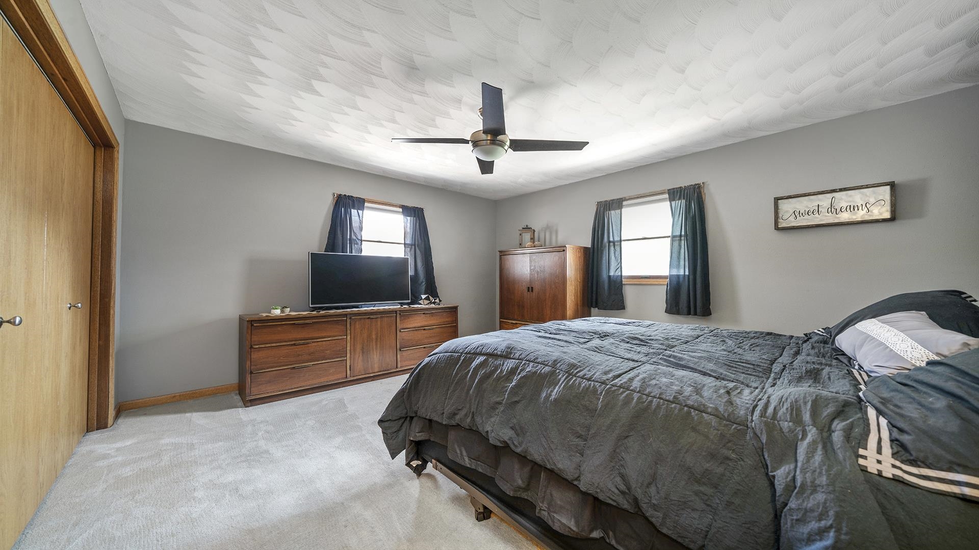 503 Sunset Drive Polo, IL 61064 - Photo 11 of 34 a bed room with a bed and a television