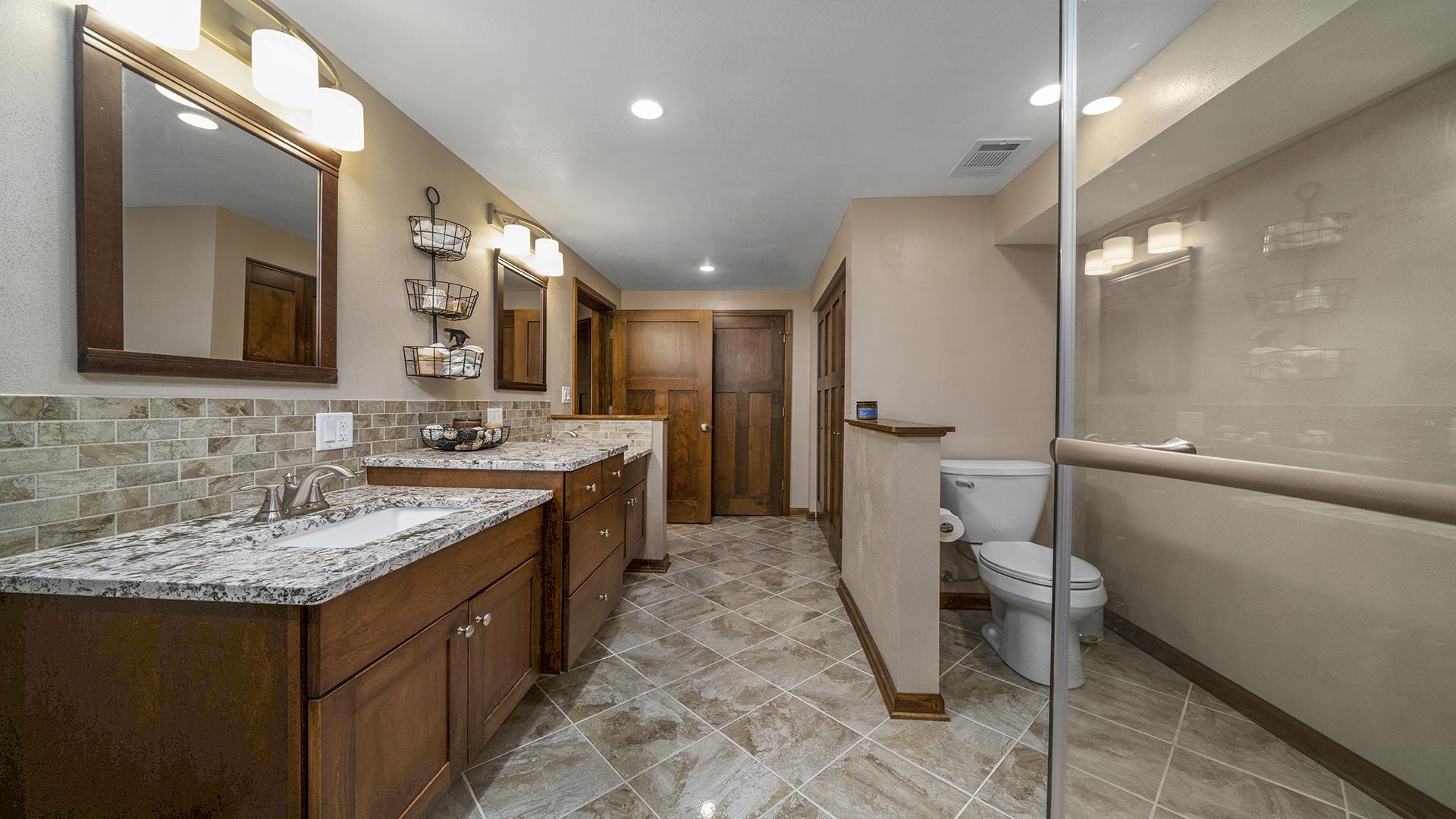 503 Sunset Drive Polo, IL 61064 - Photo 16 of 34 a bathroom with a sink a toilet and a mirror