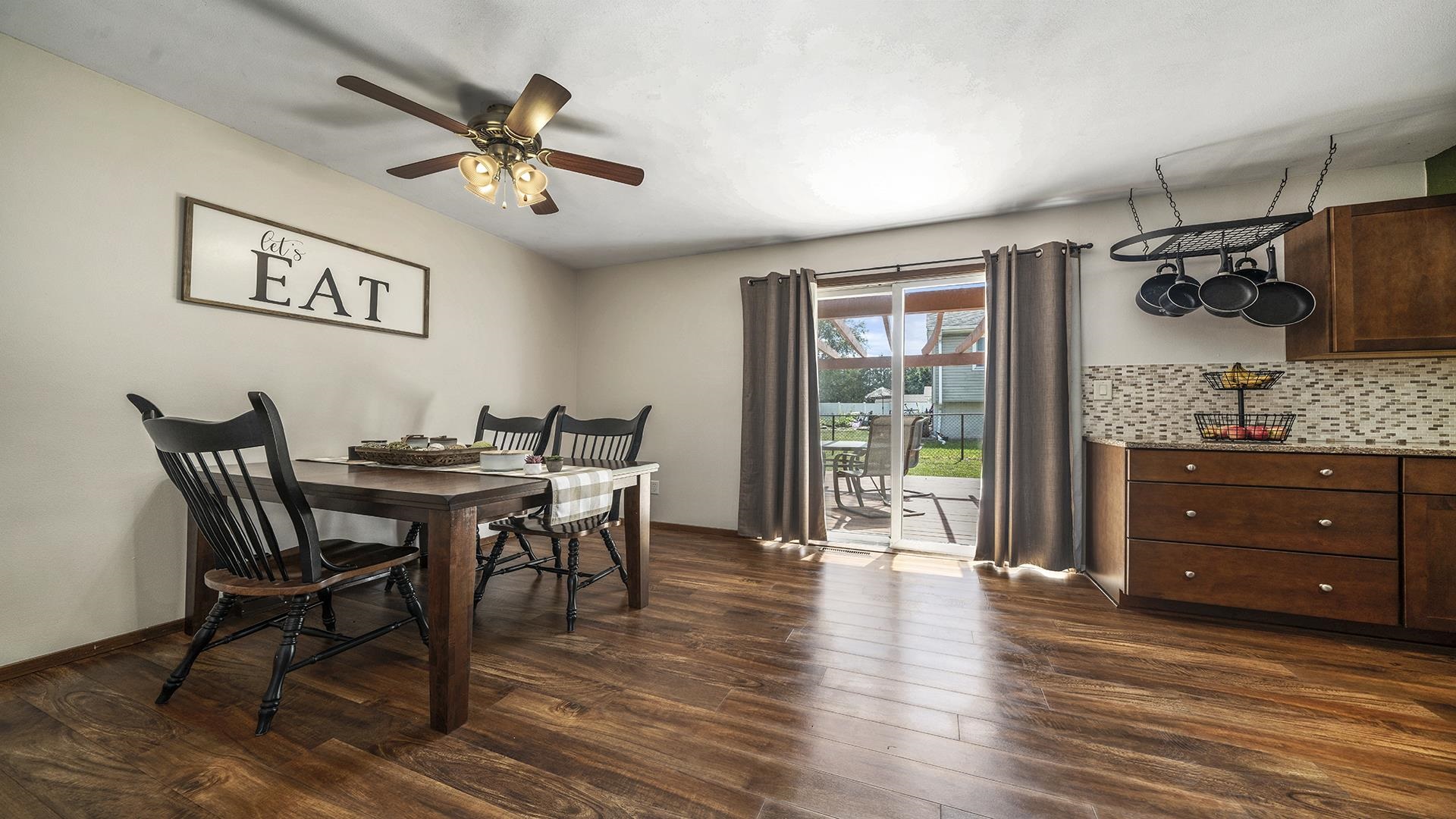 503 Sunset Drive Polo, IL 61064 - Photo 7 of 34 a view of a dining room with furniture window and wooden floor