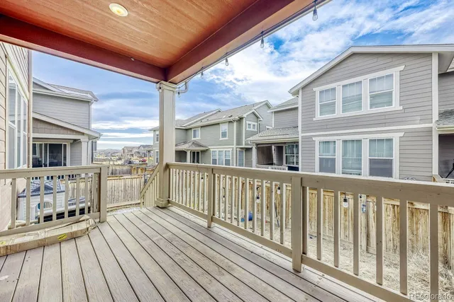 a view of a brick building from a balcony