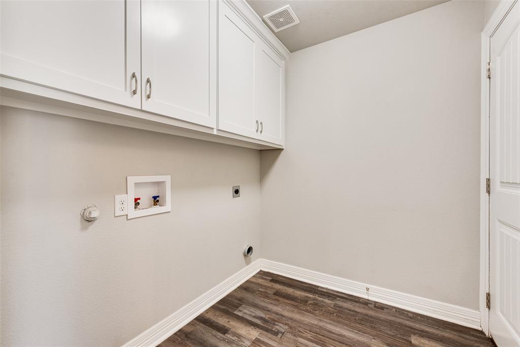 625 Copenhavr Street Pilot Point, TX 76258 - Photo 10 of 20 a view of small space with racks on the wall