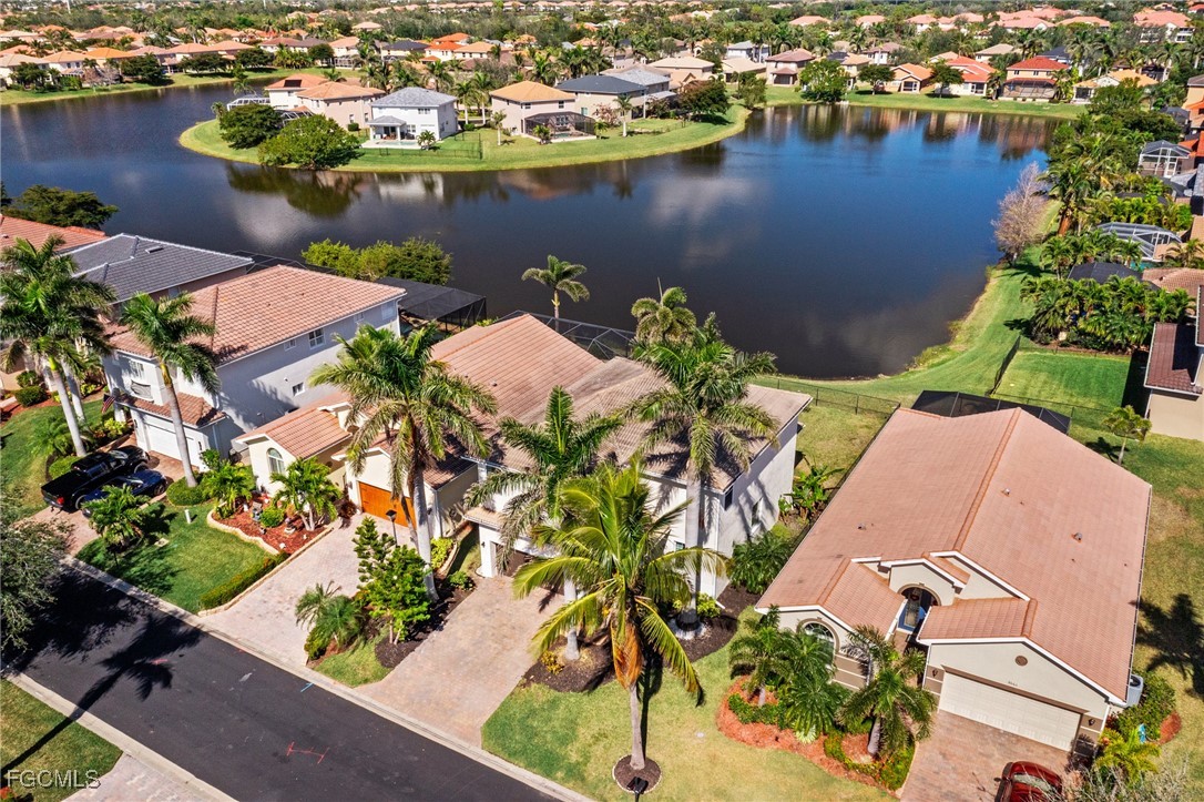 8657 Sumner Avenue Fort Myers, FL 33908 - Photo 26 of 29 an aerial view of a house with a lake view