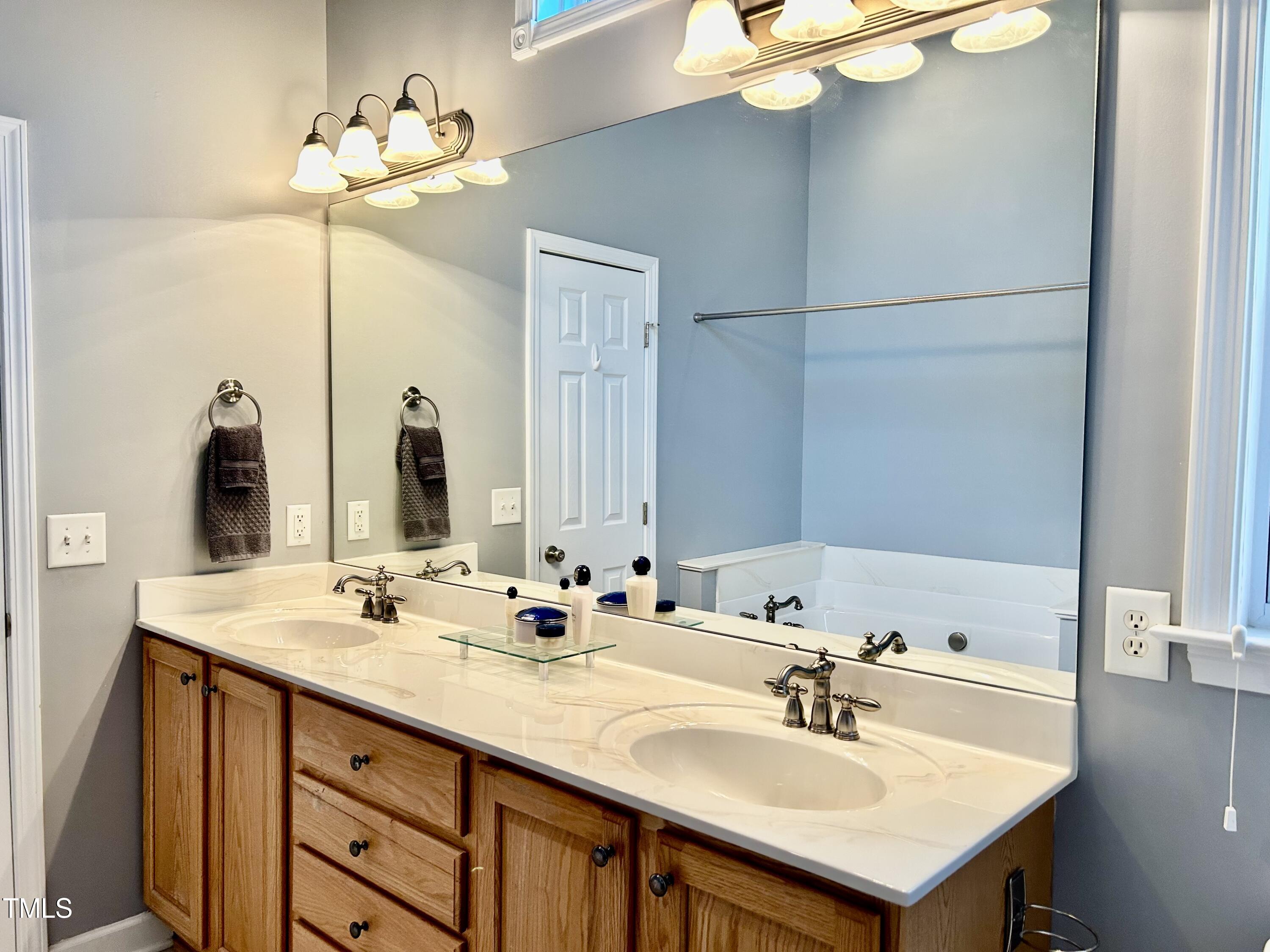 636 Seastone Street Raleigh, NC 27603 - Photo 19 of 39 Master Bath double vanity
