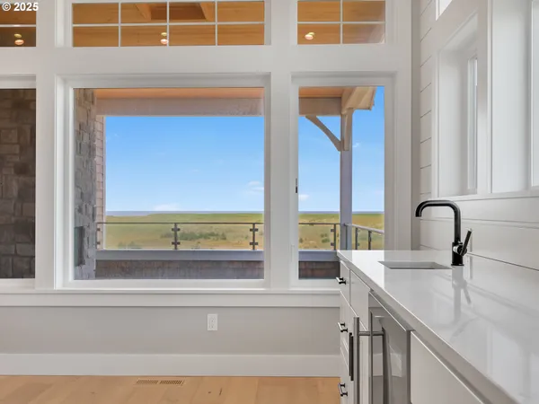 a bathroom with a sink and a large mirror
