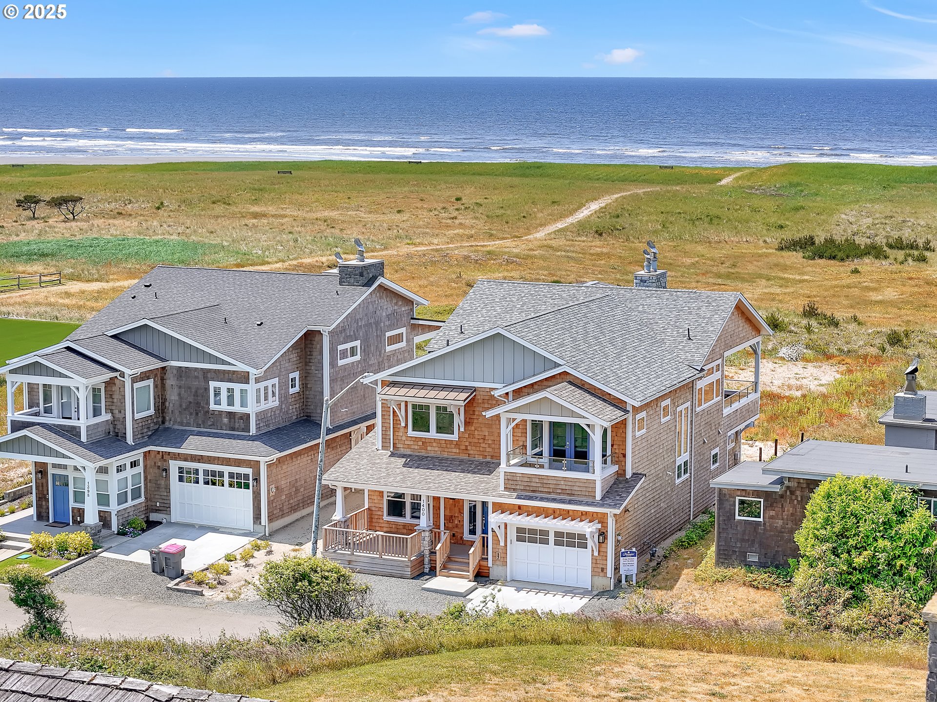 1400 North Ocean Avenue Gearhart, OR 97138 - Photo 3 of 35 a view of an ocean with a building in the background
