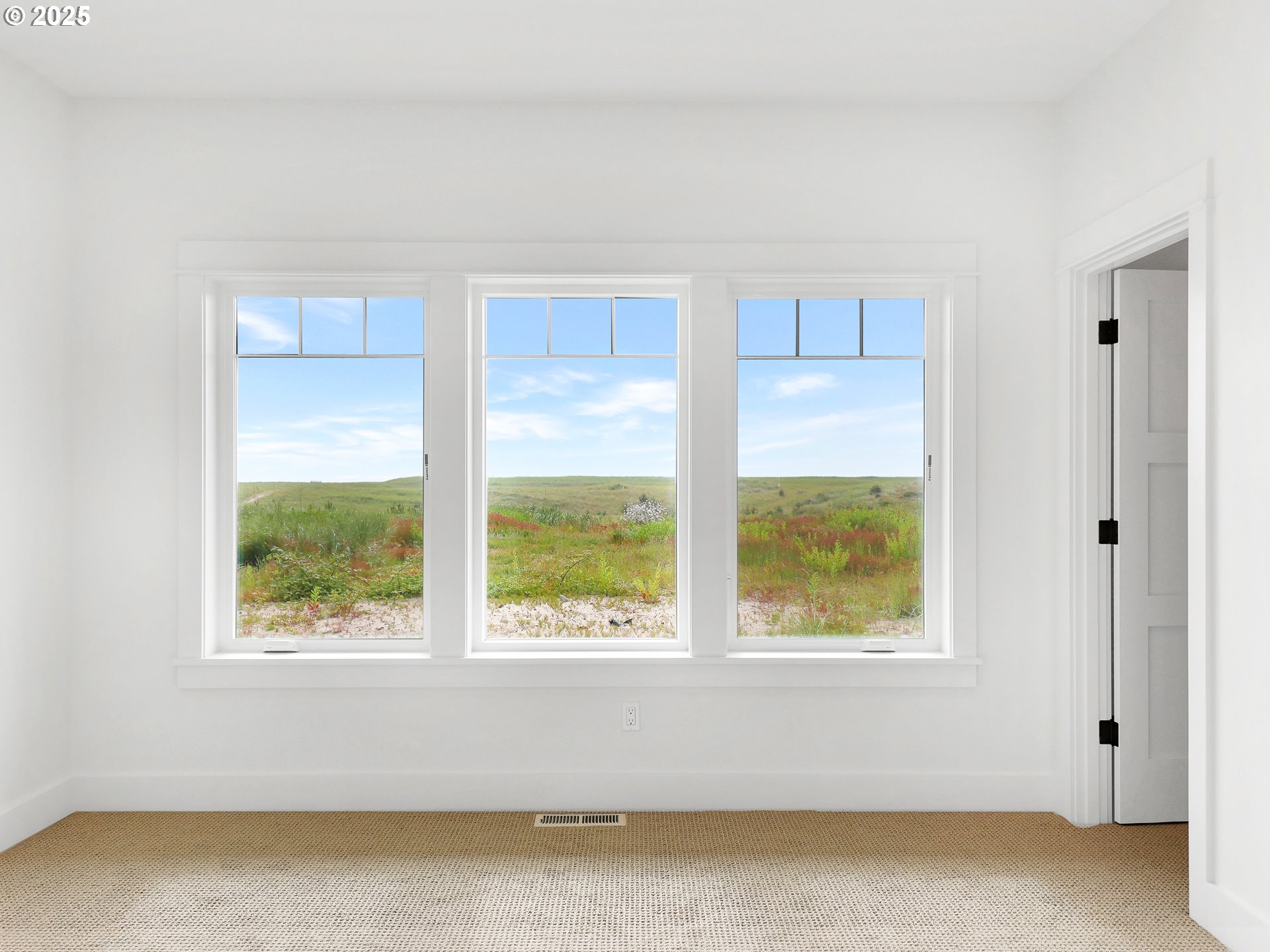 1400 North Ocean Avenue Gearhart, OR 97138 - Photo 33 of 35 a view of wooden floor and windows in a room