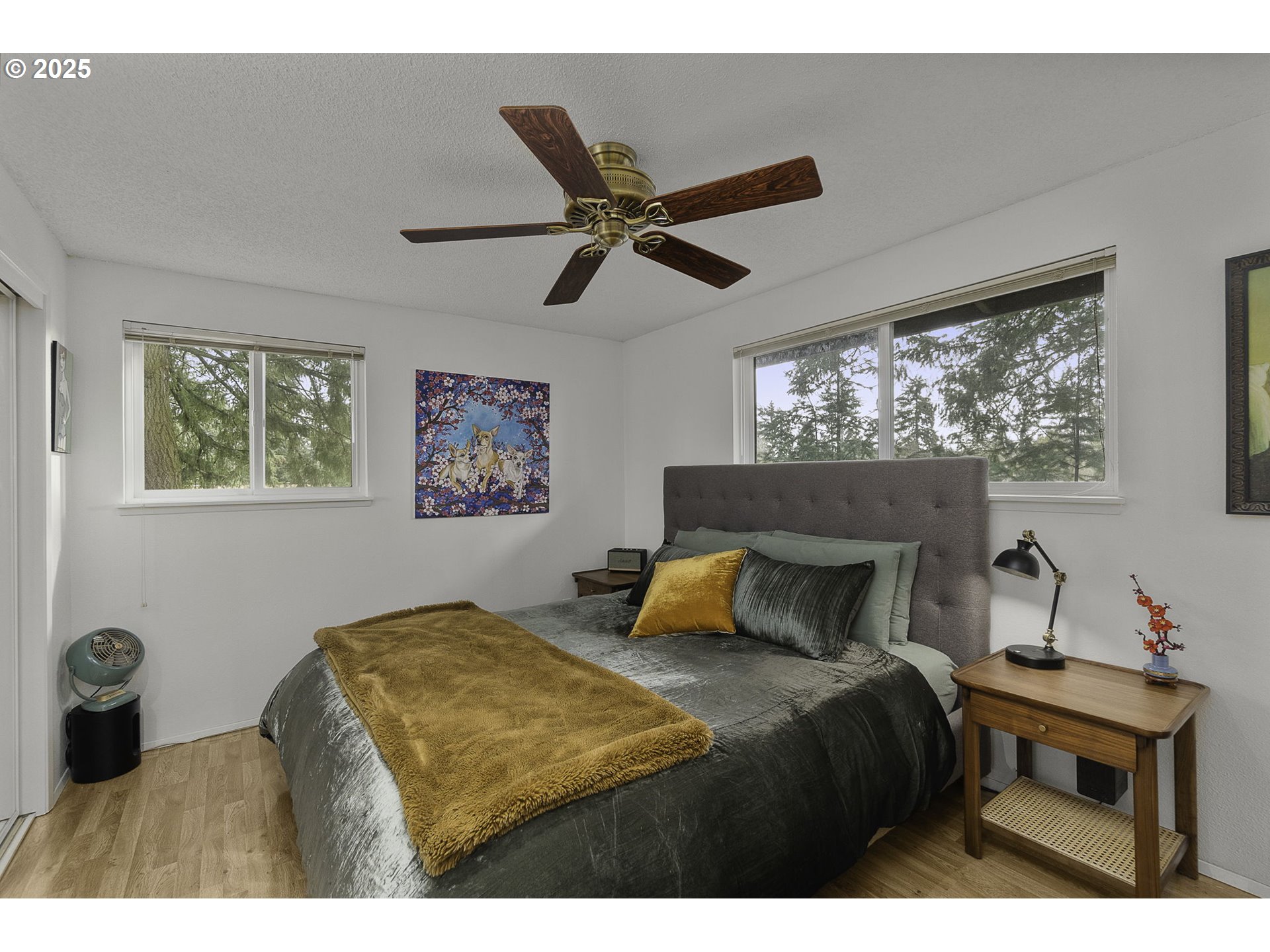 303 Cherry Avenue Oregon City, OR 97045 - Photo 12 of 30 a bedroom with a bed and a chandelier