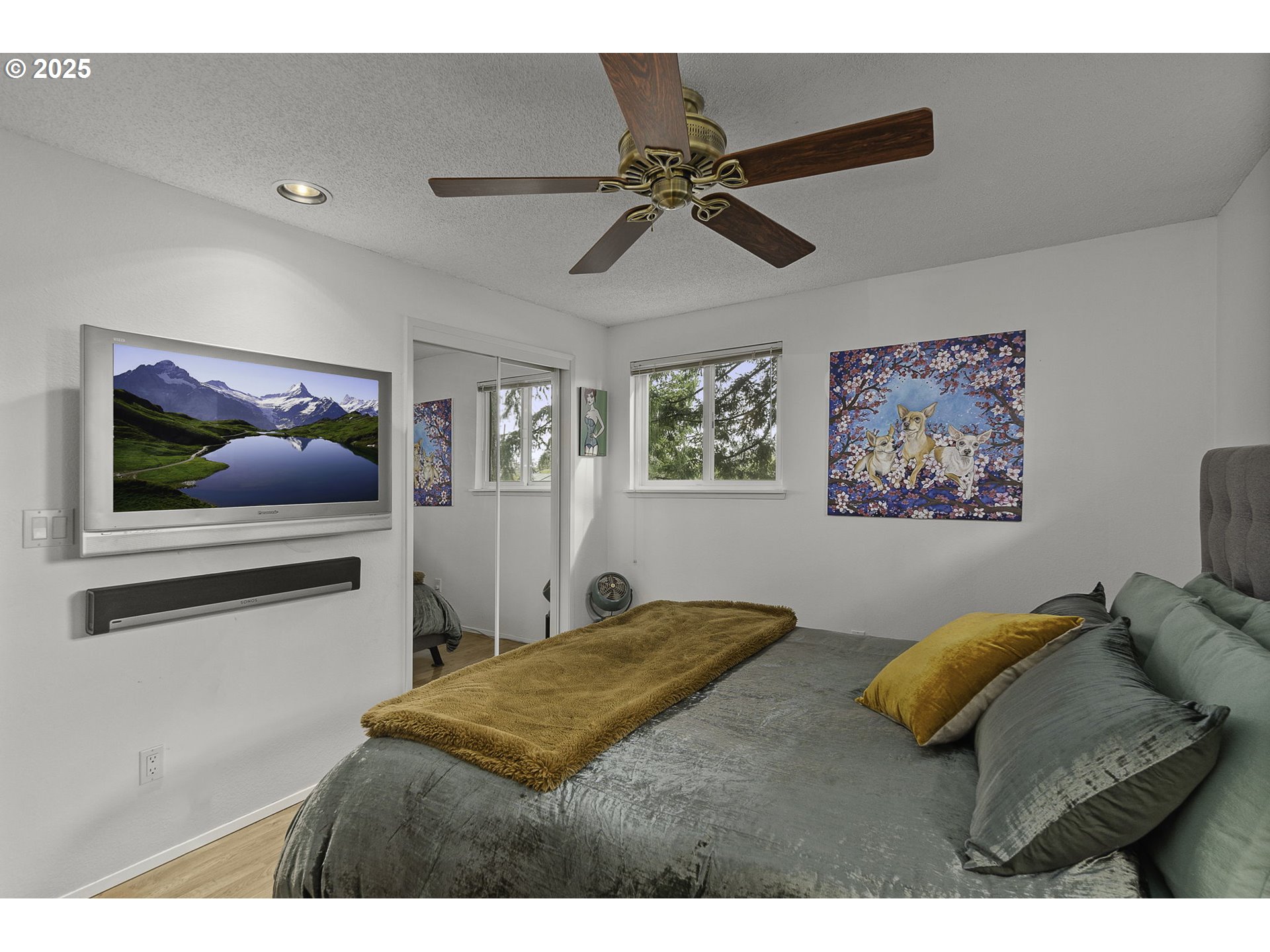 303 Cherry Avenue Oregon City, OR 97045 - Photo 13 of 30 a bedroom with a bed and two large mirror
