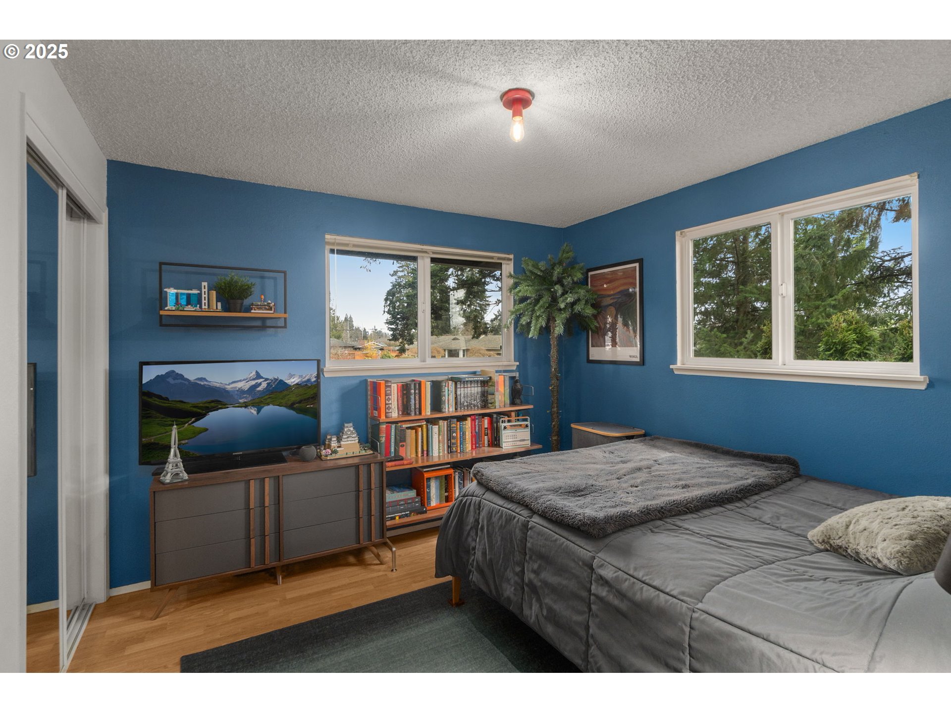 303 Cherry Avenue Oregon City, OR 97045 - Photo 15 of 30 a living room with furniture and a flat screen tv