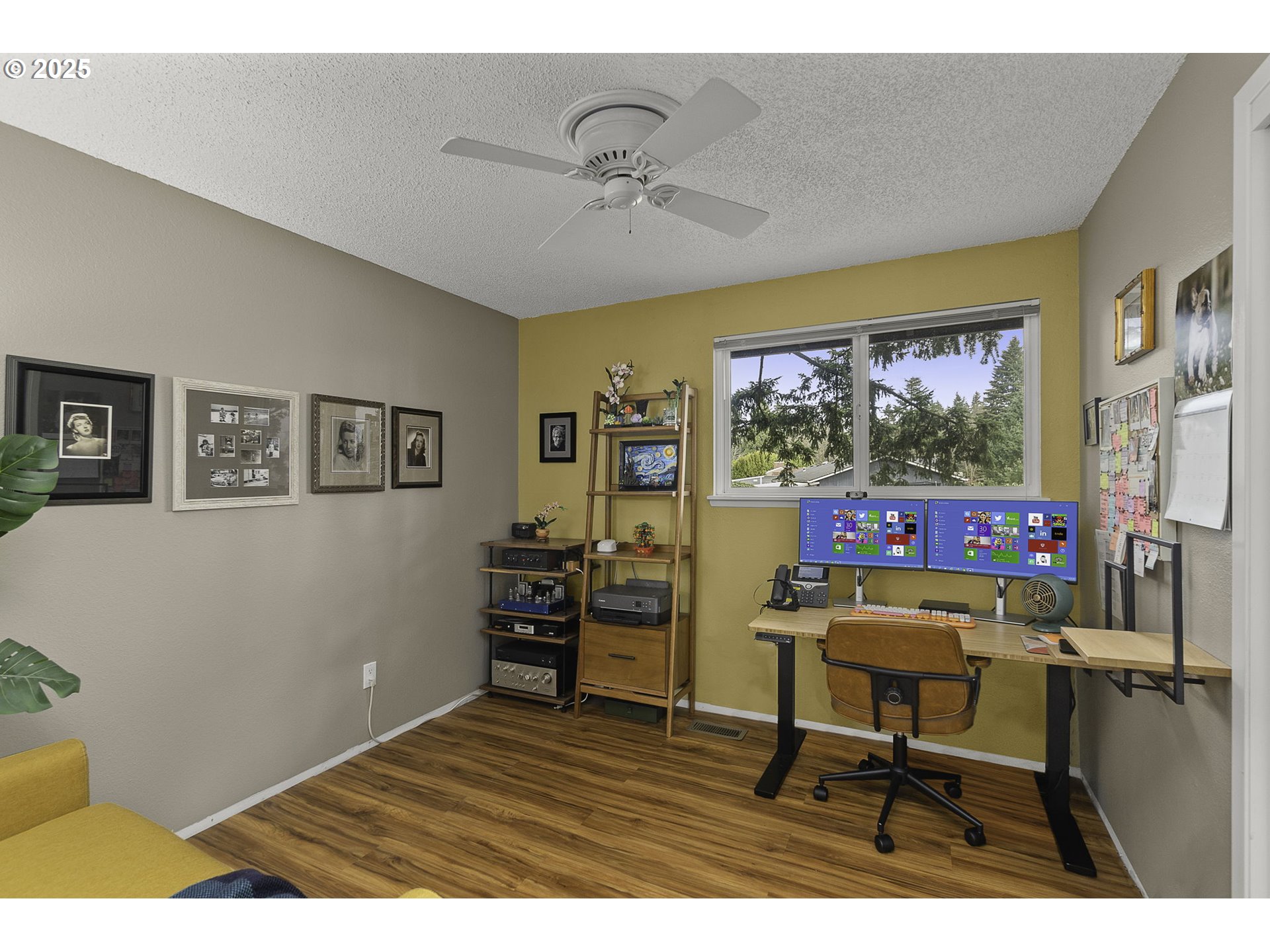 303 Cherry Avenue Oregon City, OR 97045 - Photo 16 of 30 a workspace room with furniture and a flat screen tv