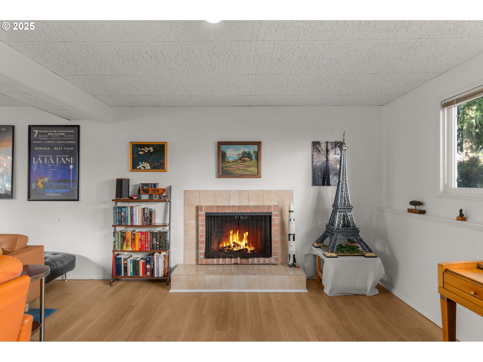 303 Cherry Avenue Oregon City, OR 97045 - Photo 20 of 30 a living room with furniture and a fireplace