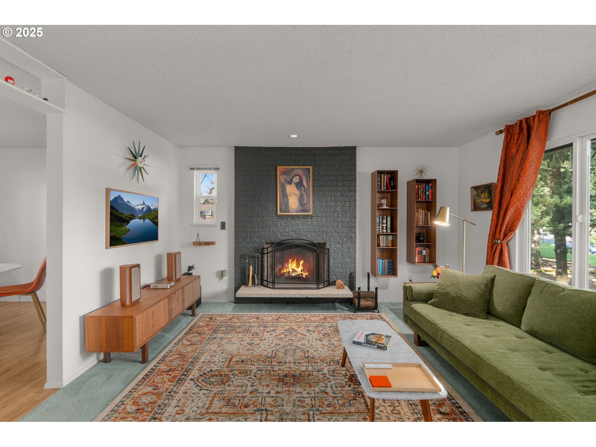 303 Cherry Avenue Oregon City, OR 97045 - Photo 3 of 30 a living room with furniture and a fireplace