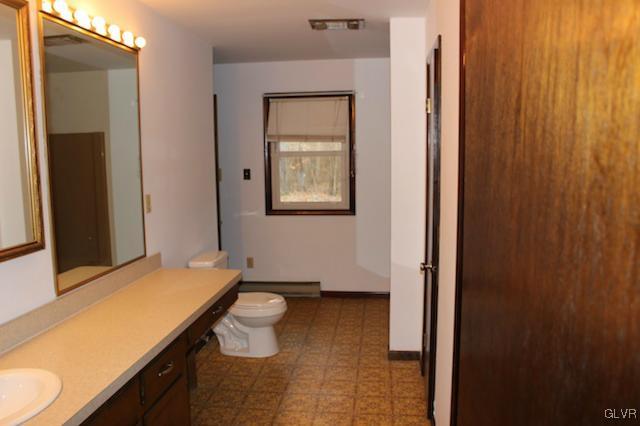 8515 Rextown Road Slatington, PA 18080 - Photo 11 of 14 a bathroom with a sink and toilet
