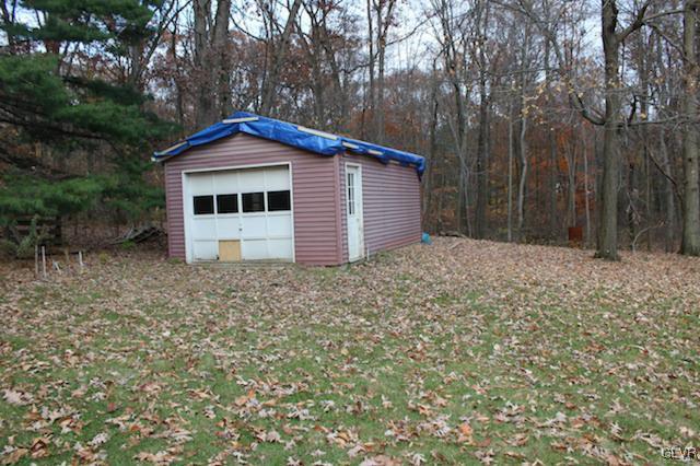 8515 Rextown Road Slatington, PA 18080 - Photo 13 of 14 a backyard of a house with lots of green space