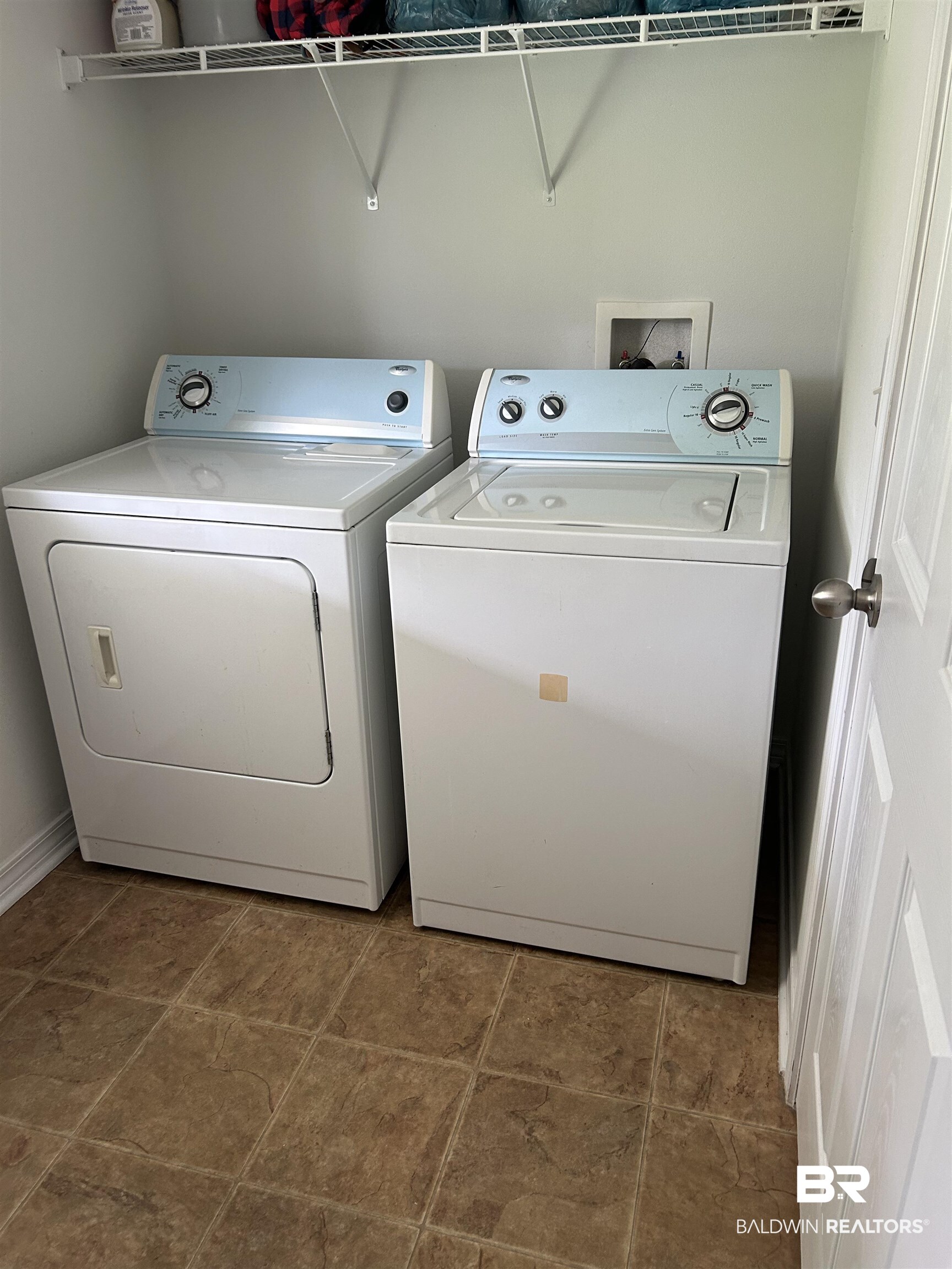 16976 Sugar Loop Foley, AL 36535 - Photo 12 of 16 Laundry room with washer and dryer