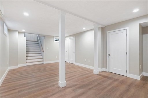 74 Hill Road, Unit A Charlton, MA 01507 - Photo 21 of 24 a view of a hallway with wooden floor
