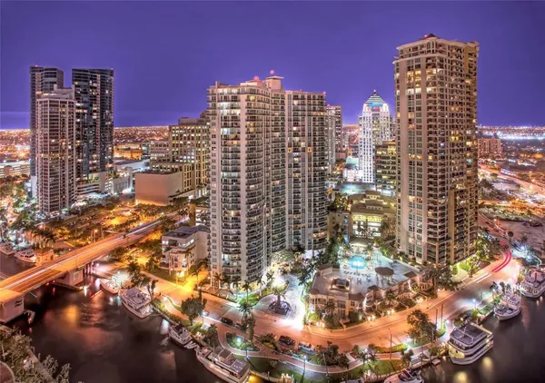 a view of a city with tall buildings