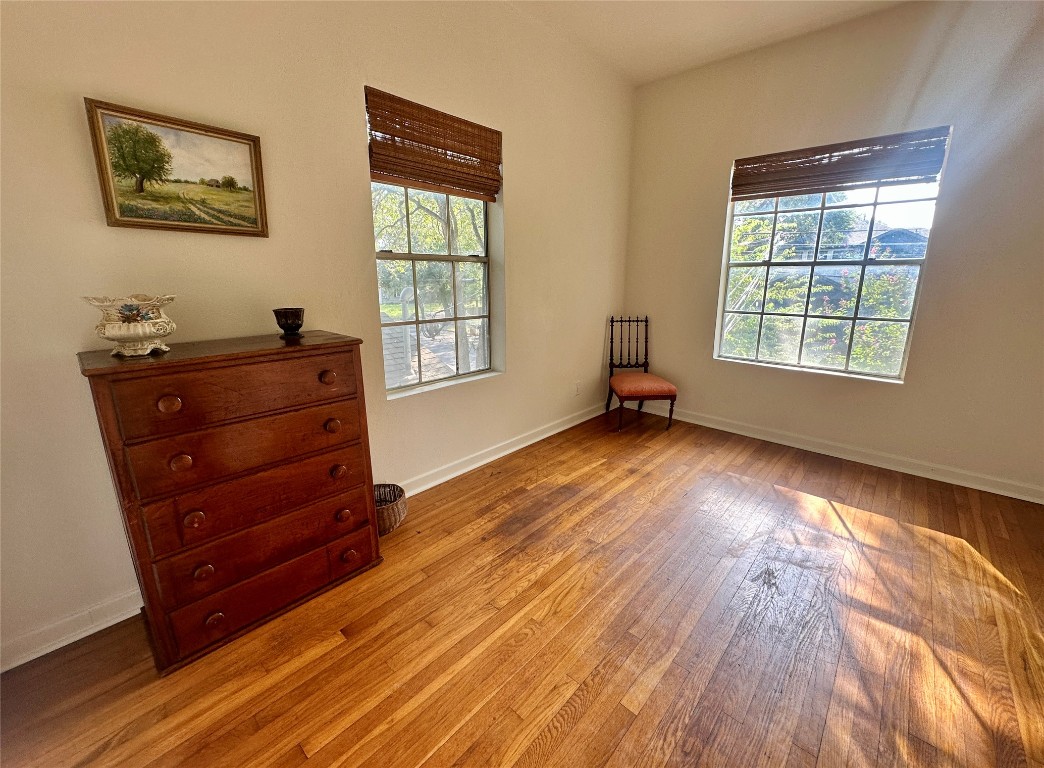 1700 Houston Street, Unit 201 Austin, TX 78756 - Photo 22 of 26 a room with couch and window