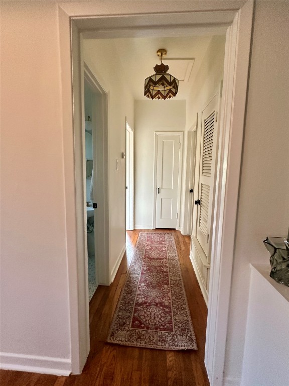 1700 Houston Street, Unit 201 Austin, TX 78756 - Photo 26 of 26 a view of a hallway with a livingroom and wooden floor