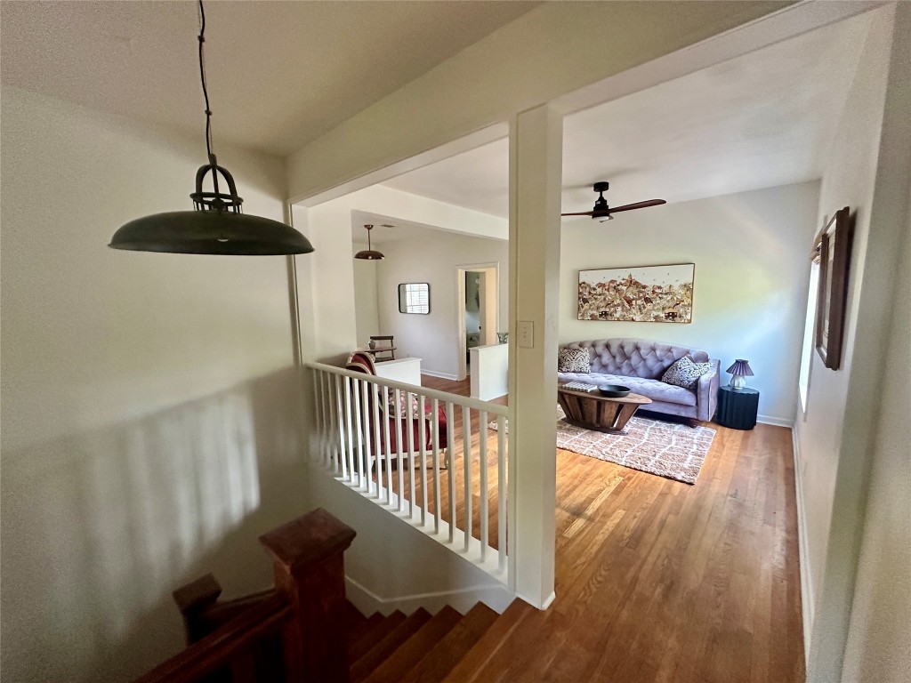 1700 Houston Street, Unit 201 Austin, TX 78756 - Photo 4 of 26 a living room with furniture and wooden floor