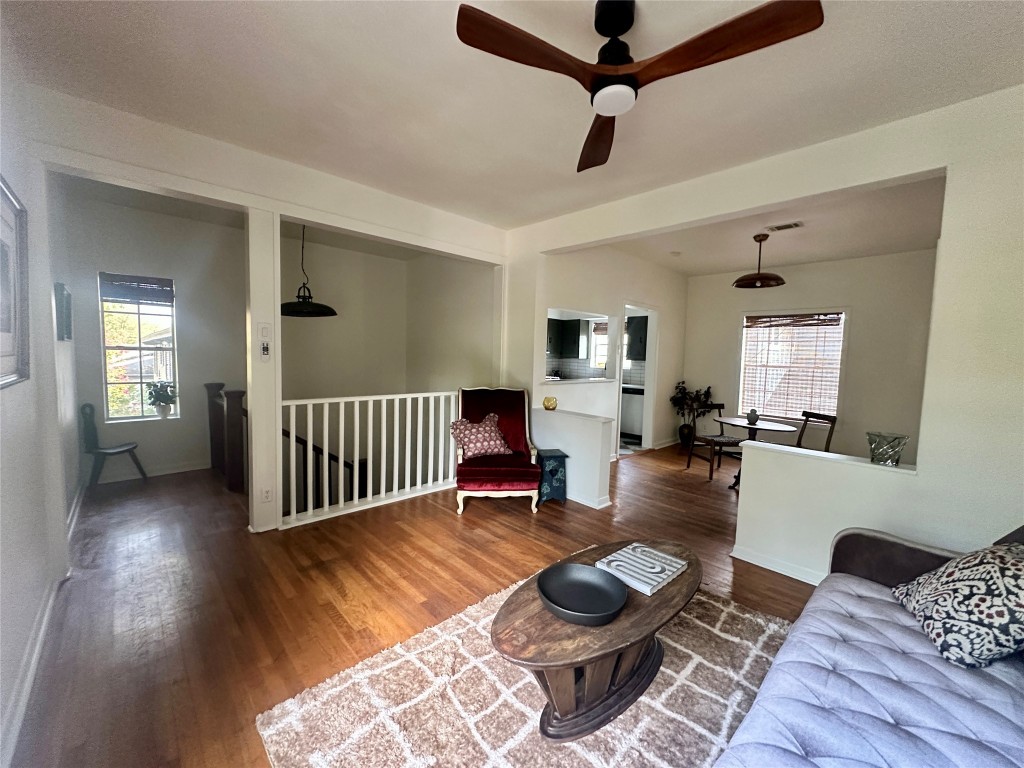 1700 Houston Street, Unit 201 Austin, TX 78756 - Photo 6 of 26 a living room with furniture and a wooden floor