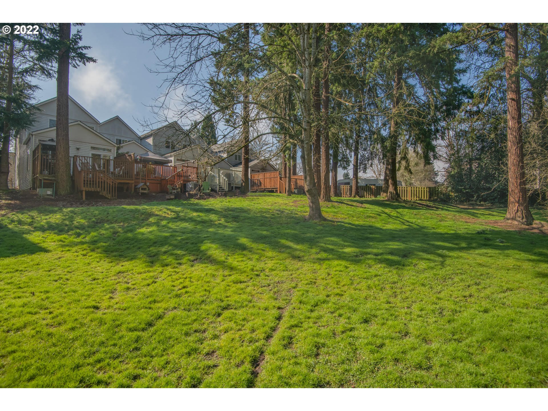 10463 Southwest Laurel Road Beaverton, OR 97005 - Photo 26 of 28 a view of a field with a tree