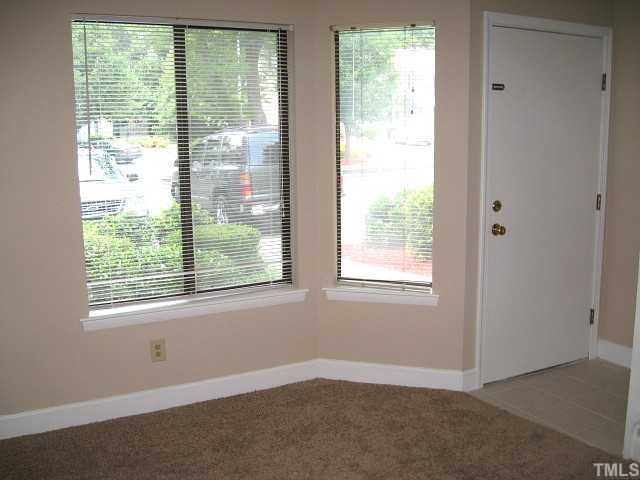 5846 Shady Grove Circle Raleigh, NC 27609 - Photo 5 of 10 Alternate view of living room showing tile entry
