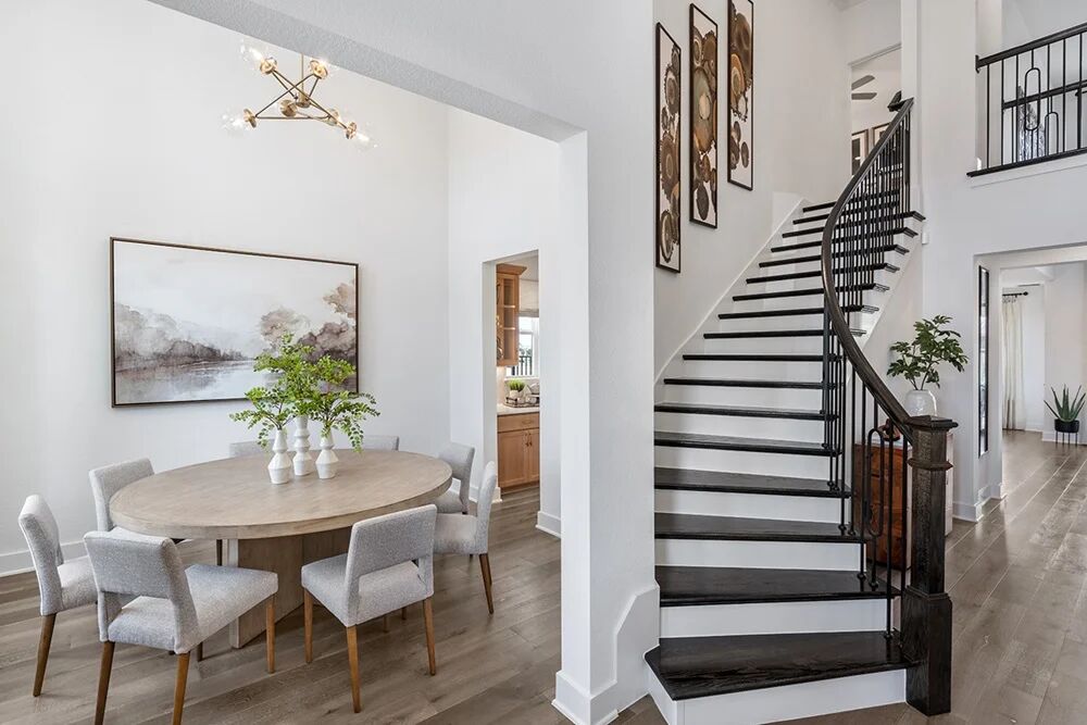 1509 Caylea Blf Lane Georgetown, TX 78628 - Photo 11 of 30 a view of a dining room with furniture and wooden floor