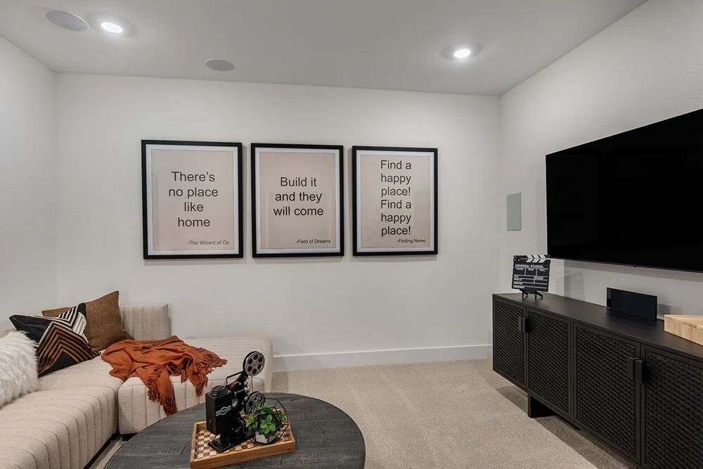 1509 Caylea Blf Lane Georgetown, TX 78628 - Photo 16 of 30 a living room with furniture and a flat screen tv