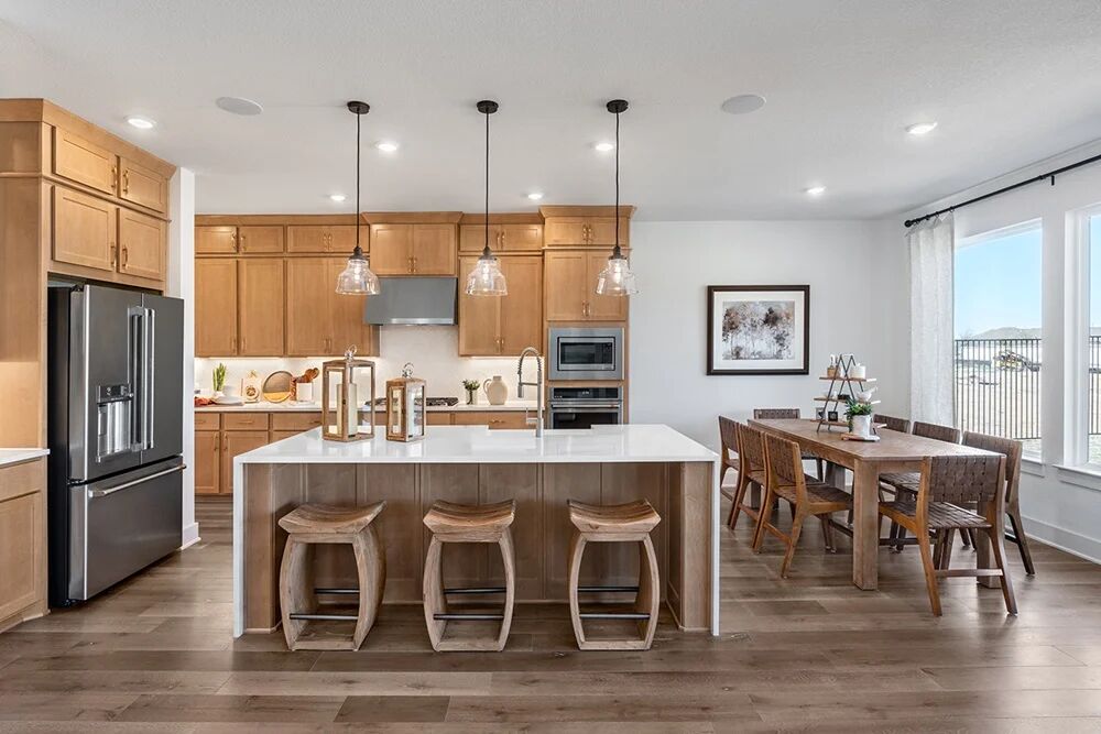 1509 Caylea Blf Lane Georgetown, TX 78628 - Photo 5 of 30 a large kitchen with a table and chairs